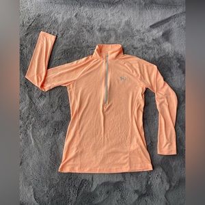 Soft orange Under Armour Women’s half zip